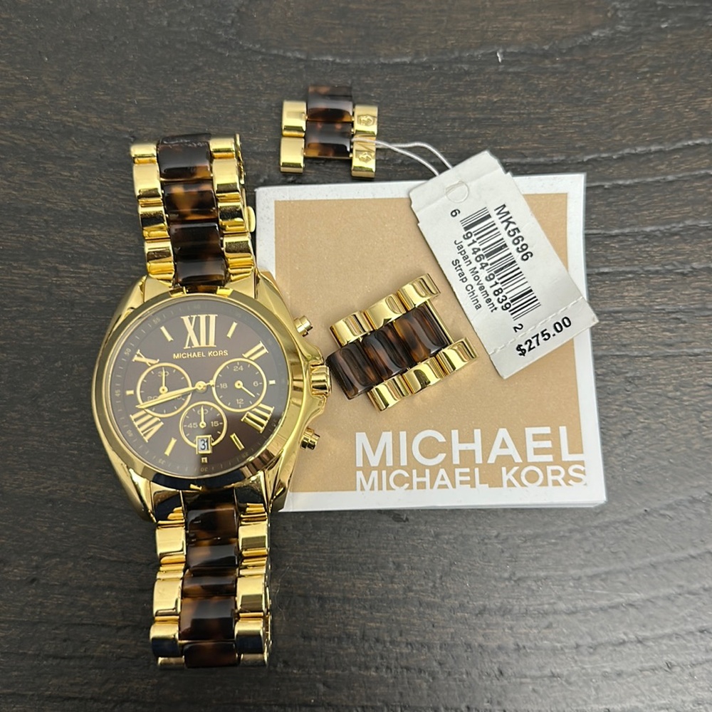 Michael Kors gold and tourtoise color watch.